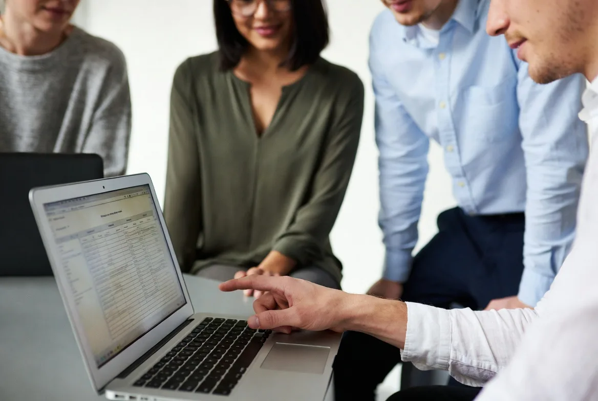 team planning proactive customer engagement strategy together