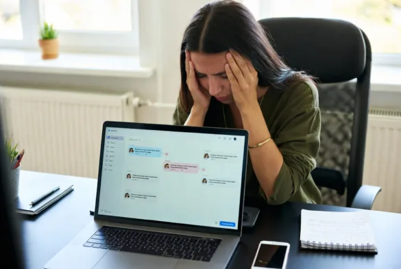 overwhelmed support agent managing high volume of tickets